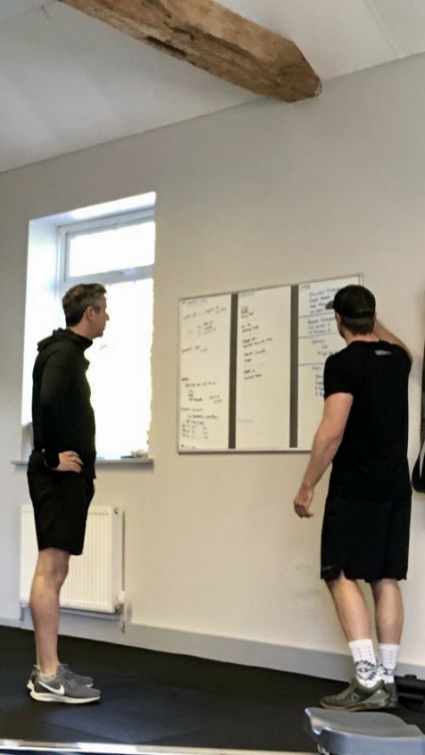 Client doing an assisted pull-up
